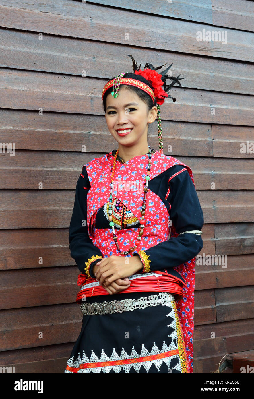 Portrait of Beautiful Malaysia Borneo Native Girl in Traditional Costumes. Stock Photo
