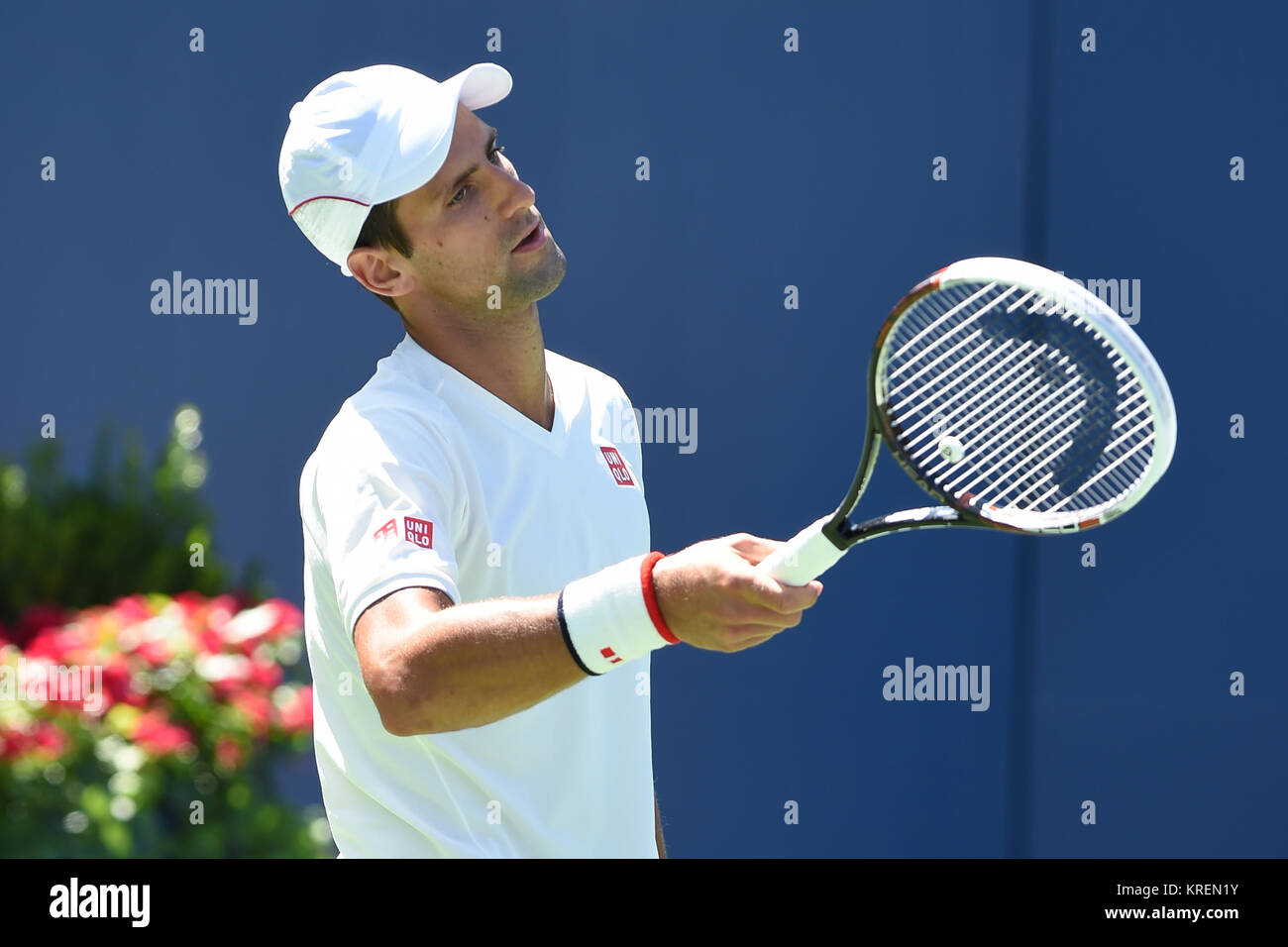 NEW YORK, NY - AUGUST 24: Novak Djokovic is sighted practicing on Arthur Ashe Stadium court at the USTA Billie Jean King National Tennis Center on August 24, 2014 in the Queens borough of New York City.   People:  Novak Djokovic Stock Photo