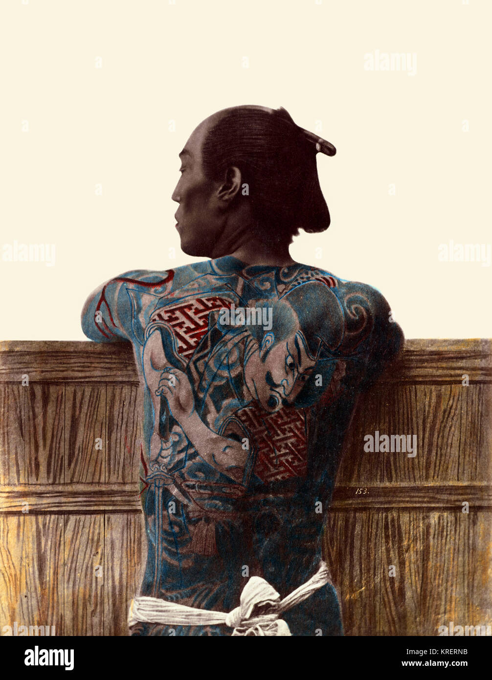 Japanese Tattoo; Kusakabe Kimbei (Japanese, 1841 - 1934, active 1880s - about 1912), or Baron Raimund von Stillfried (Austrian, 1839 - 1911); Japan; 1870s - 1890s; Hand-colored albumen silver print; 26 x 20 cm (10 1/4 x 7 7/8 in.); 84.XA.700.4.57 Stock Photo