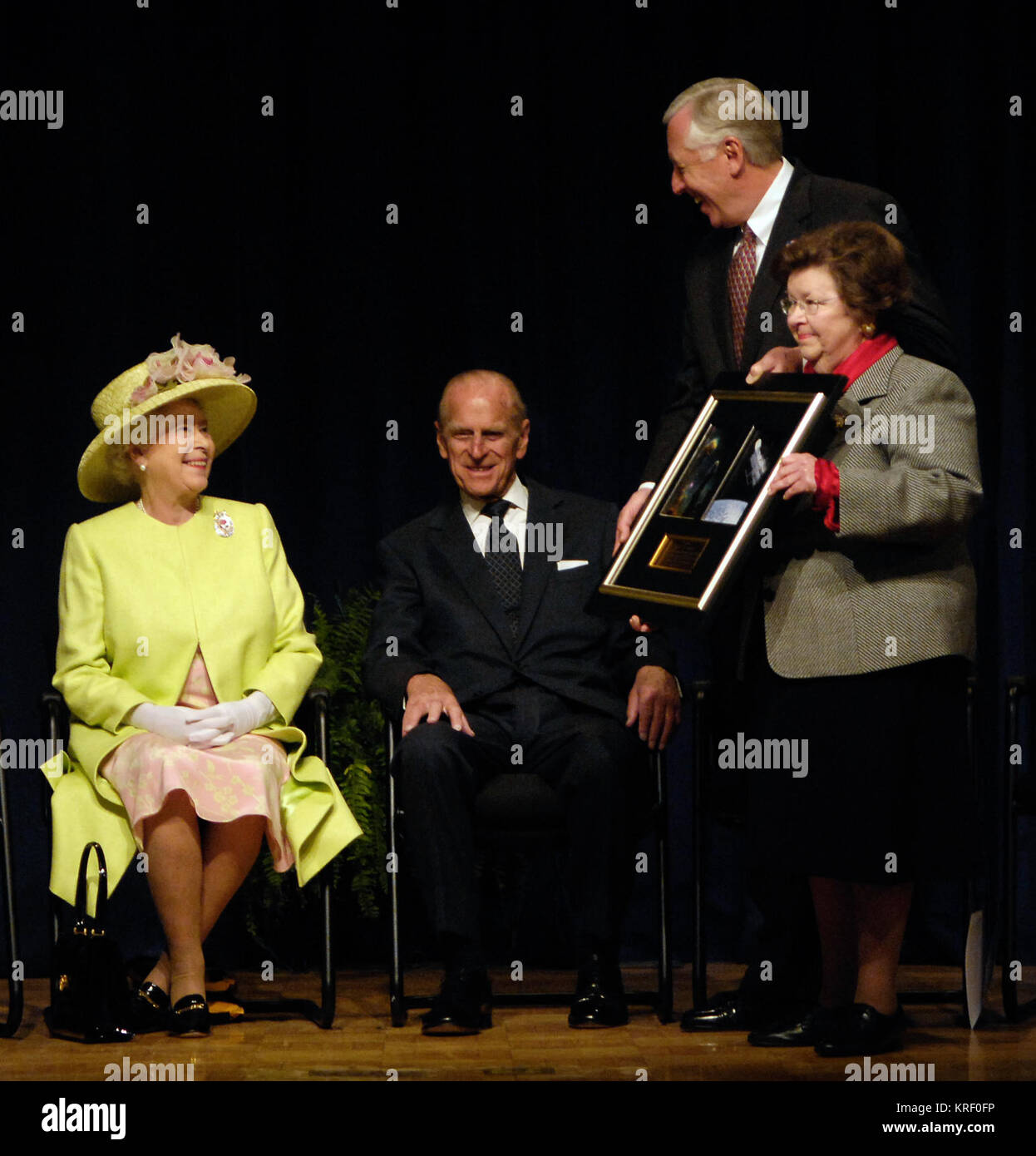 Queen Elizabeth II is presented with a framed photograph of the Hubble Space Telescope by Rep. Steny Hoyer, D-Md., and Sen. Barbara Mikulski, D-Md., during a visit to the NASA Goddard Space Flight Center, Tuesday, May 8, 2007, in Greenbelt, Md. NASA and the British National Space Centre have collaborated on the Hubble project. The Royal couple's appearance was one of the last stops on a six-day visit to the United States. Photo Credit 'NASA/Paul E. Alers' Rep. Hoyer and Sen. Mikulski present photo to Queen Elizabeth II and Prince Phillip, May 8, 2007 Stock Photo