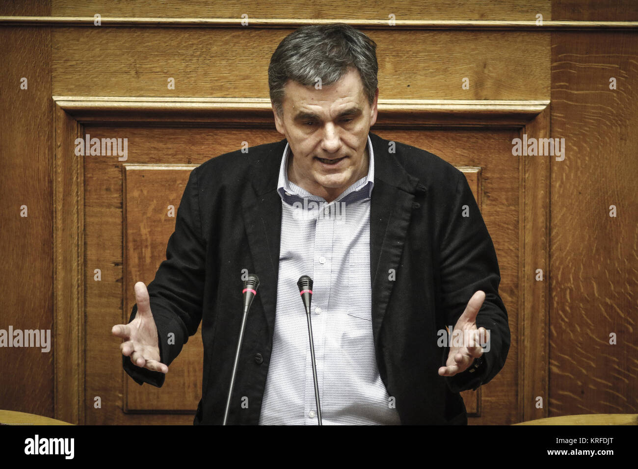 Athens, Greece. 19th Dec, 2017. Greek Finance Minister Euclid Tsakalotos addresses lawmakers during the parliament's session for the 2018 state budget in Athens, Greece, on Dec. 19, 2017. Greek lawmakers ratified on Tuesday evening the 2018 state budget. Credit: Marios Lolos/Xinhua/Alamy Live News Stock Photo