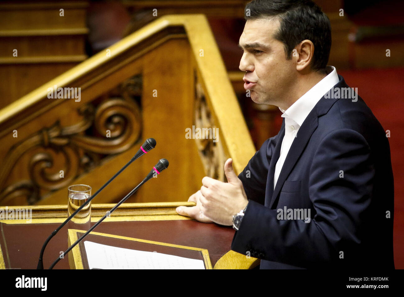 Athens, Greece. 19th Dec, 2017. Greek Prime Minister Alexis Tsipras addresses lawmakers during the parliament's session for the 2018 state budget in Athens, Greece, on Dec. 19, 2017. Greek lawmakers ratified on Tuesday evening the 2018 state budget. Credit: Marios Lolos/Xinhua/Alamy Live News Stock Photo