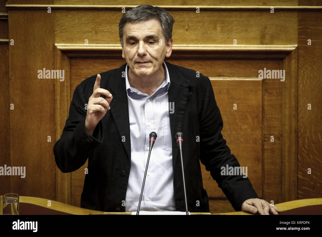 Athens, Greece. 19th Dec, 2017. Greek Finance Minister Euclid Tsakalotos addresses lawmakers during the parliament's session for the 2018 state budget in Athens, Greece, on Dec. 19, 2017. Greek lawmakers ratified on Tuesday evening the 2018 state budget. Credit: Marios Lolos/Xinhua/Alamy Live News Stock Photo