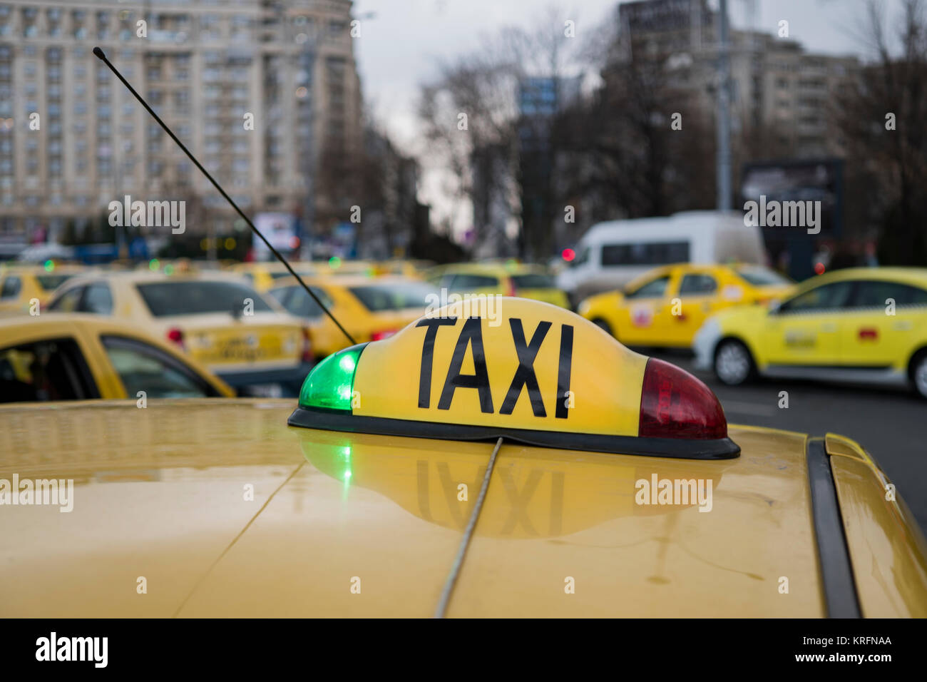 Bucharest, Romania - December 20, 2017: Romanian taxi drivers protest in front of the government headquarters against Uber and other apps that steal their clients. Stock Photo