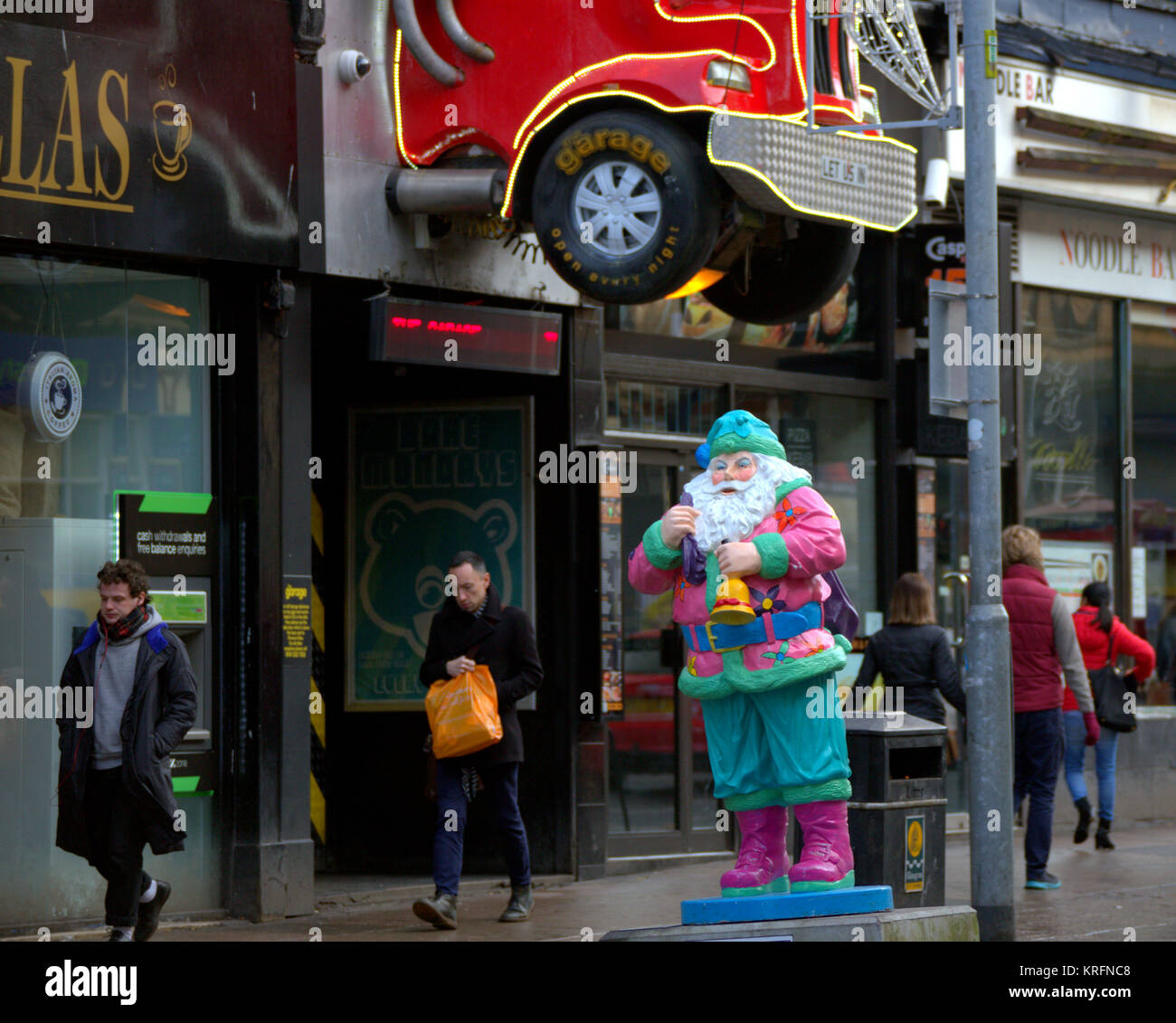 Glasgow, Scotland, UK 20th December. Santas on Sauchiehall Street six-foot statues have been designed by pupils at Garnetbank Primary School to support Business Improvement District (BID) work. Credit: gerard ferry/Alamy Live News Stock Photo