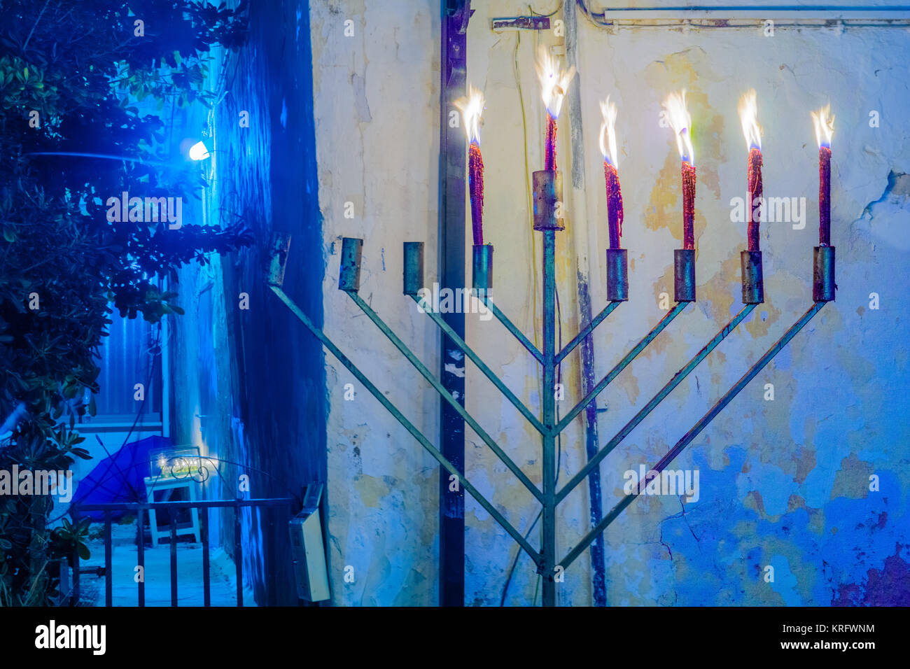 Traditional Menorahs (Hanukkah Lamps), in an alley in the Jewish