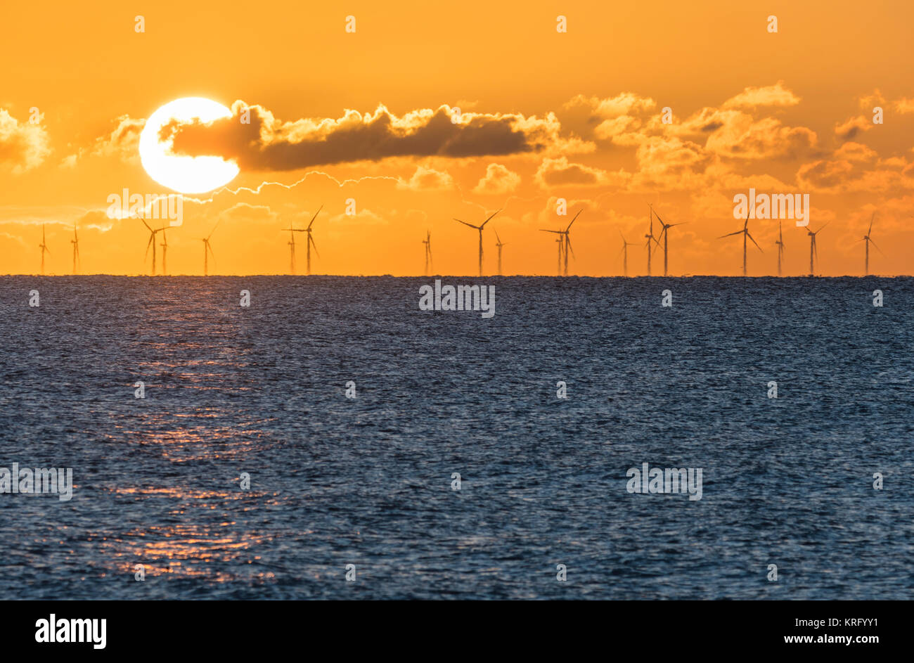 Sunrise over the sea at the site of the Rampion Offshore Wind Farm development in the sea off the South Coast of England, UK. Stock Photo