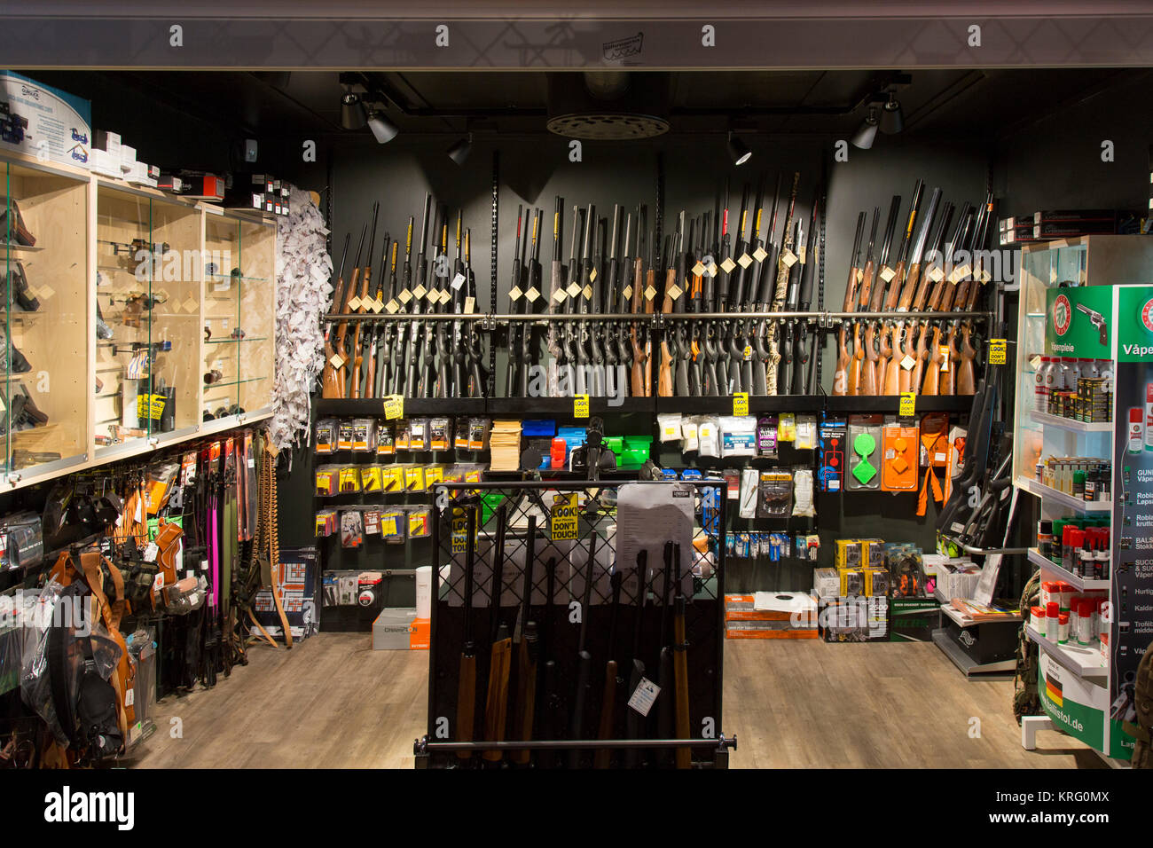 Interior of gunstore selling rifles, handguns and other firearms at Longyearbyen, Svalbard / Spitsbergen, Norway Stock Photo