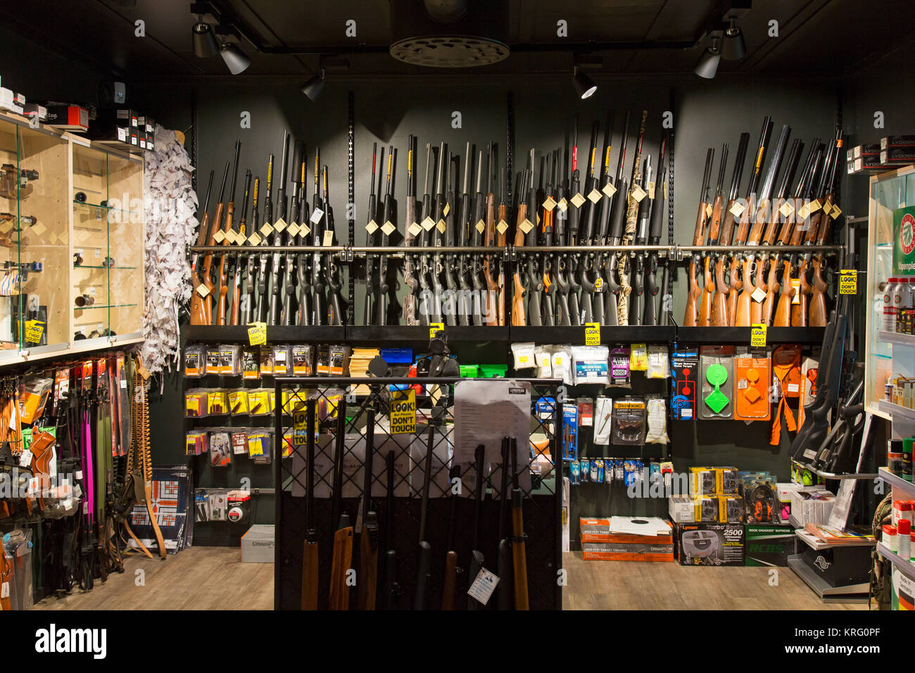 Interior of gunstore selling rifles, handguns and other firearms at Longyearbyen, Svalbard / Spitsbergen, Norway Stock Photo