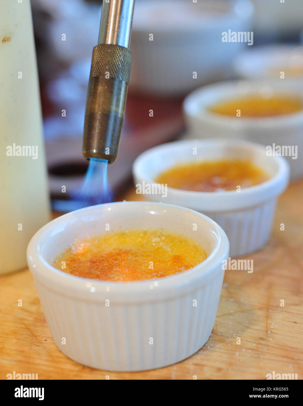 Creme brûlée in ramekins Stock Photo Alamy