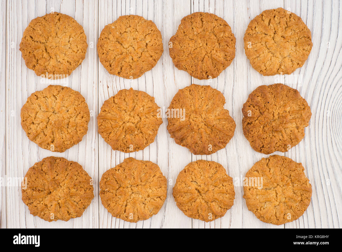 Cookie on an old white wooden table. Stock Photo