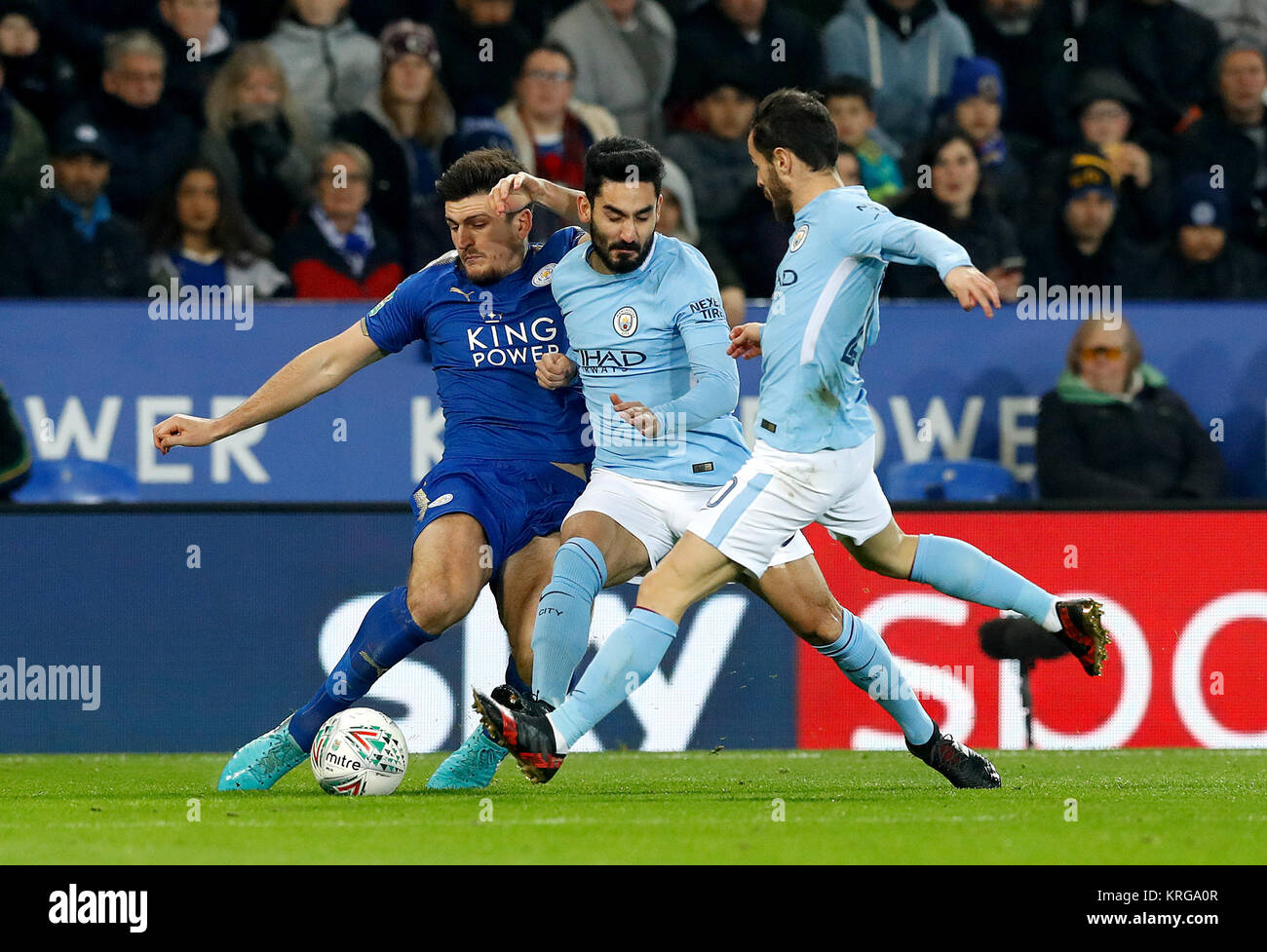 Manchester City's Ilkay Gundogan (centre) and Bernardo Silva (right