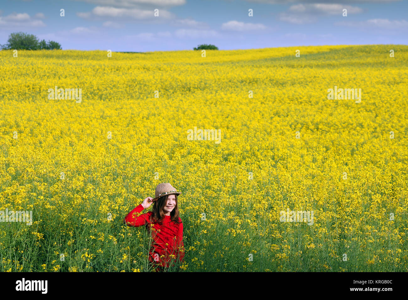 happy little girl on field spring season Stock Photo - Alamy