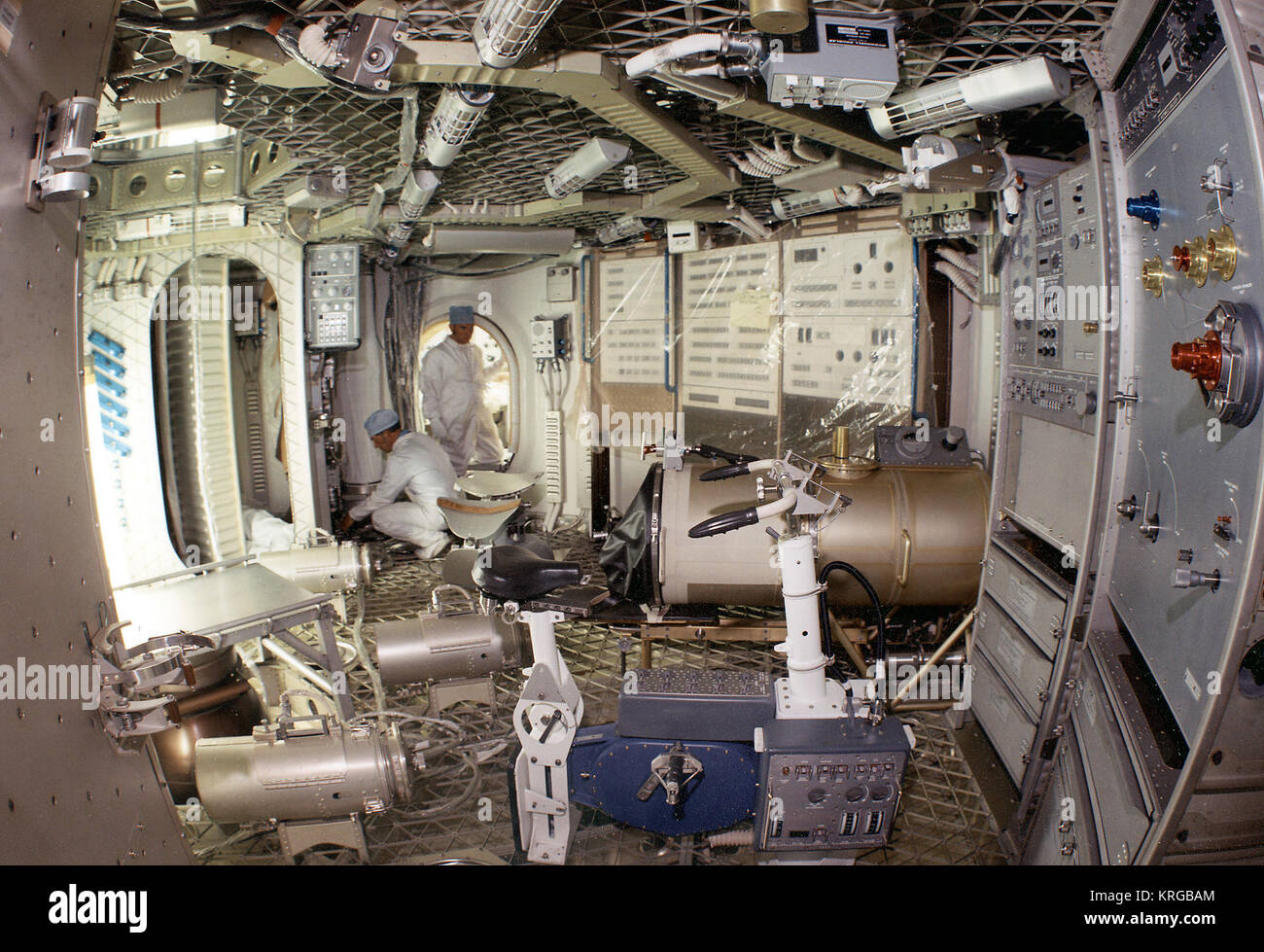Wide Overall View Of Lower Level Experiment Area. In Center Foreground, Section Of Sh ower Stall and Bicycle Ergometer. (MIX File) The Skylab Orbital Workshop Experiment Area 7030269 Stock Photo