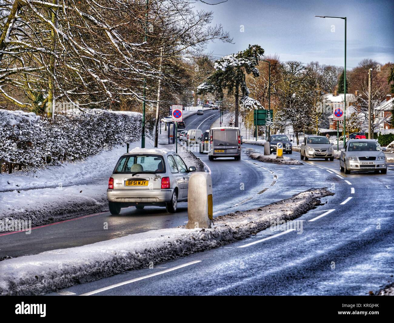 Slippery and icy roads after snowy weekend Stock Photo - Alamy