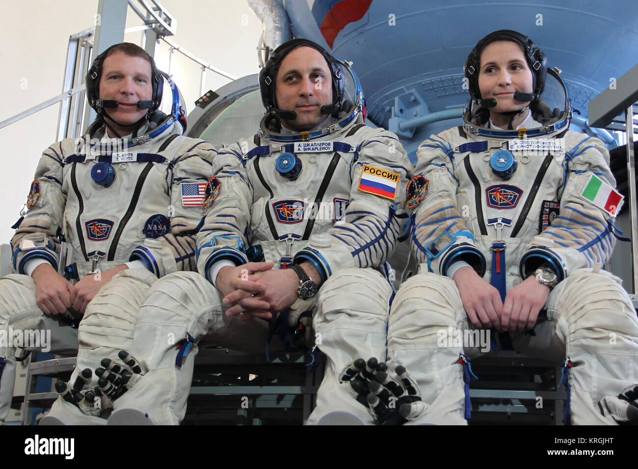 0176:  At the Gagarin Cosmonaut Training Center in Star City, Russia, Expedition 40/41 backup crewmembers Terry Virts of NASA (left), Soyuz commander Anton Shkaplerov of the Russian Federal Space Agency (Roscosmos, center) and Samantha Cristoforetti of the European Space Agency (right) pose for pictures in front of a Soyuz simulator May 6 as part of their final qualification exams for flight. They are the backups to the prime crew --- Reid Wiseman of NASA, Max Suraev of Roscosmos and Alexander Gerst of the European Space Agency --- who are in the final stages of training for launch May 29, Kaz Stock Photo