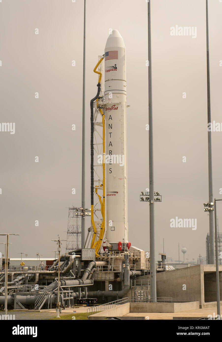 The Orbital Sciences Corporation Antares rocket, with the Cygnus spacecraft onboard, is seen on launch Pad-0A, Friday, July 11, 2014, at NASA's Wallops Flight Facility in Virginia. The Antares will launch with the Cygnus spacecraft filled with over 3,000 pounds of supplies for the International Space Station, including science experiments, experiment hardware, spare parts, and crew provisions. The Orbital-2 mission is Orbital Sciences' second contracted cargo delivery flight to the space station for NASA. Photo Credit: (NASA/Bill Ingalls) Antares Orb-2 at Wallops pad (201407110001HQ) Stock Photo