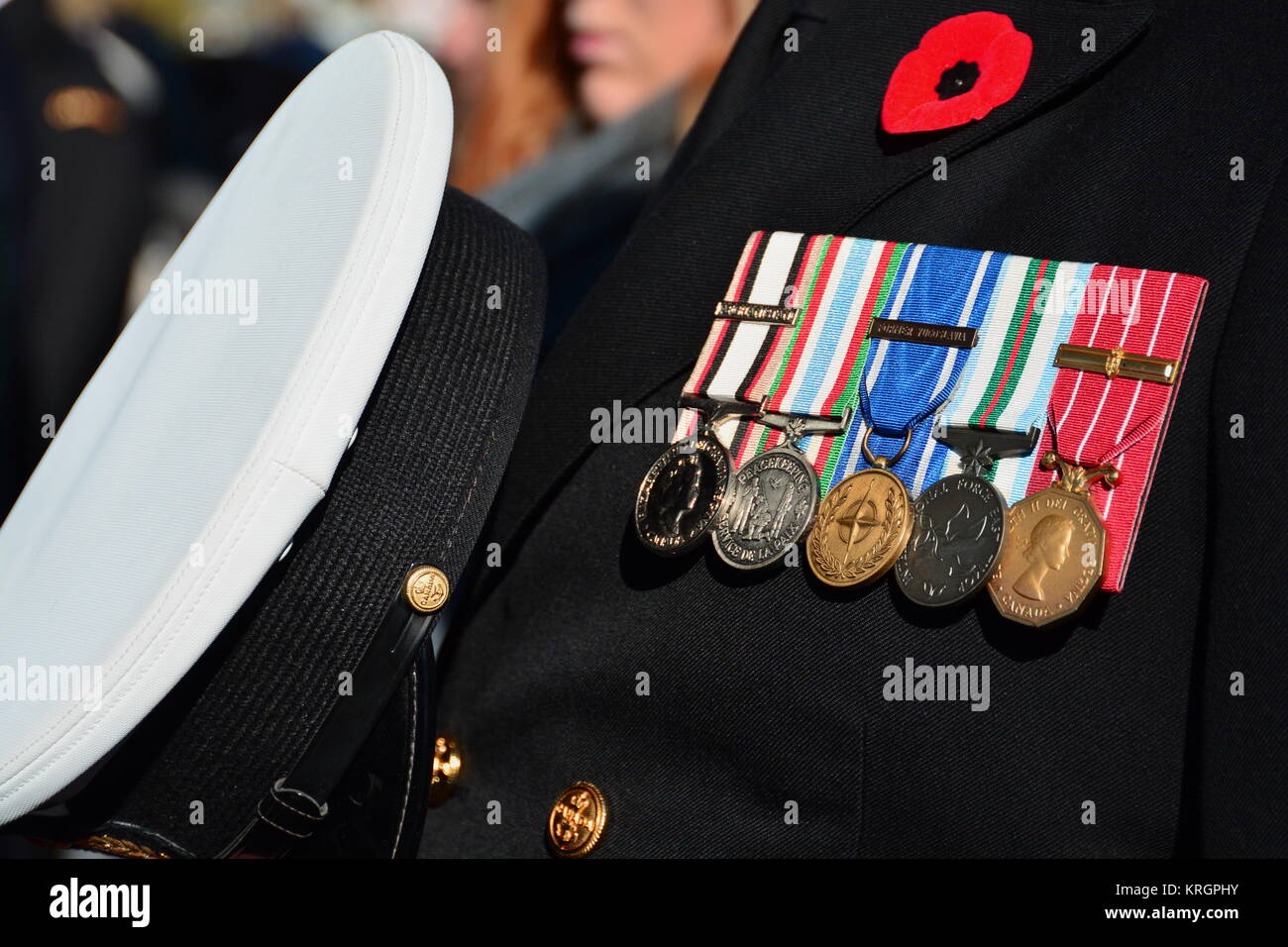 A war veterans medals on display on his coat on Remembrance Day. Stock Photo