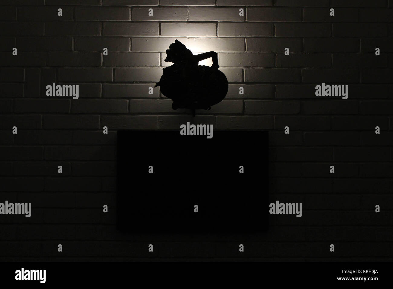 The silhouette of Javanese puppet, called "Wayang". The character is ...