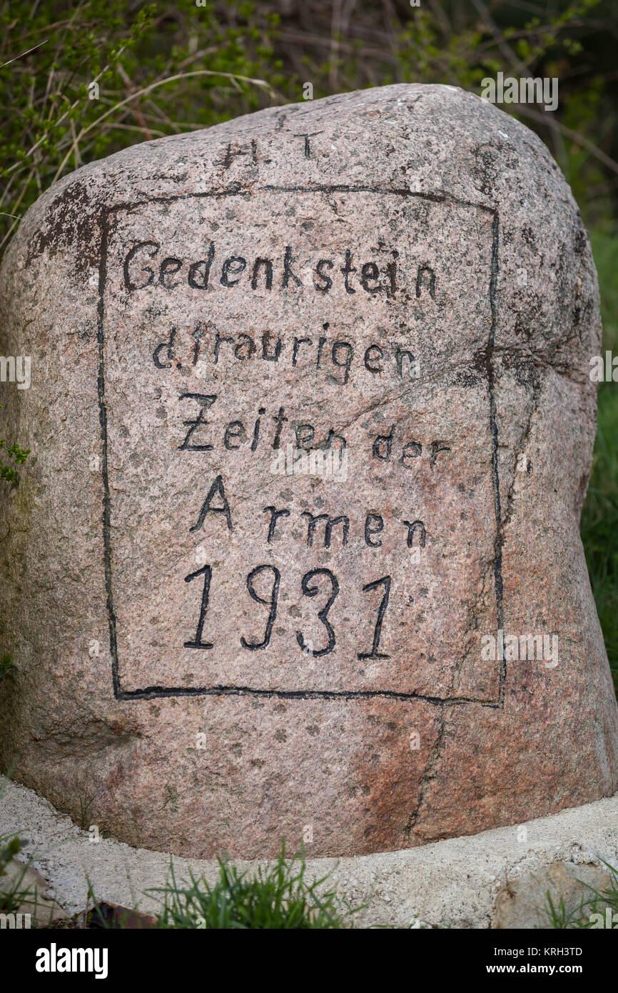 memorial stone of the sad times of the poor in 1931 Stock Photo
