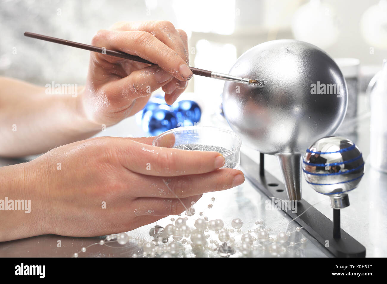 factory of christmas decorations,decoration of glass balls Stock Photo