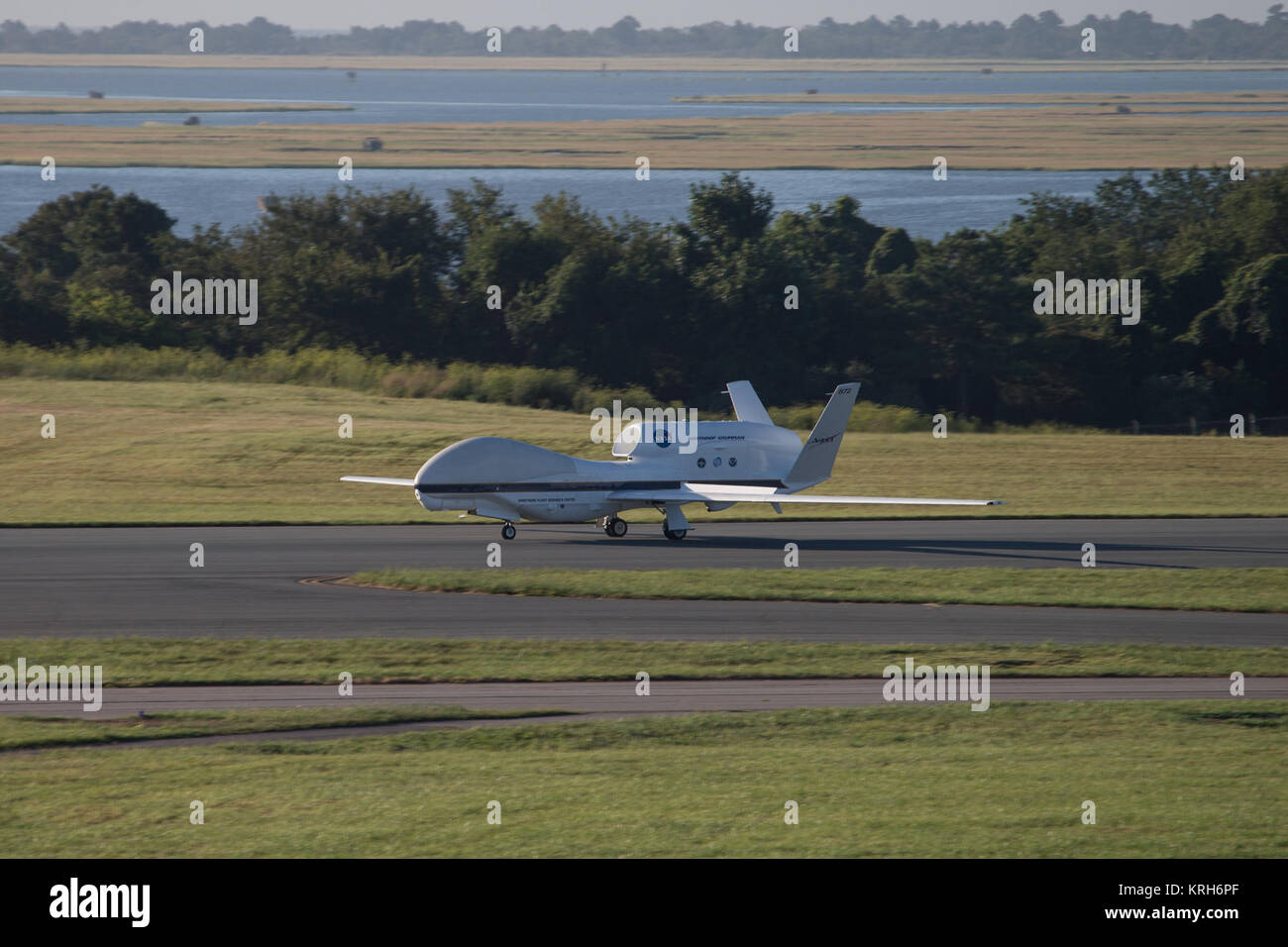 NASA's 2014 HS3 Hurricane Mission Begins: Global Hawk Lands at Wallops   The NASA Global Hawk 872 lands at 7:43 a.m. EDT, August 27, at the Wallops Flight Facility in Virginia following a 22-hour transit flight from its home base at the Armstrong Flight Research Center in California.  During the transit, the science instruments on the aircraft provided researchers data on Hurricane Cristobal in the Atlantic Ocean of the southeastern coast of the United States.  The aircraft is one of two NASA Global Hawks supporting the Hurricane and Severe Storm Sentinel (HS3) mission through September.  Cred Stock Photo