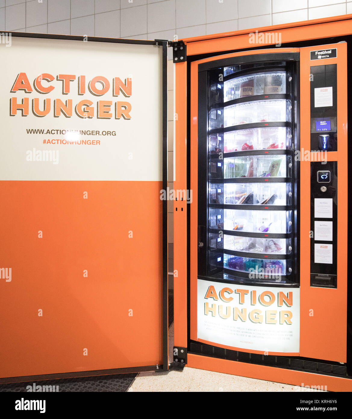 The first vending machine for the homeless, set up by the charity Action Hunger in the Broad Marsh Shopping Centre, Nottingham. The Machine only dispenses food, toothbrushes and sanitary products to those given a special card by the local council. Stock Photo