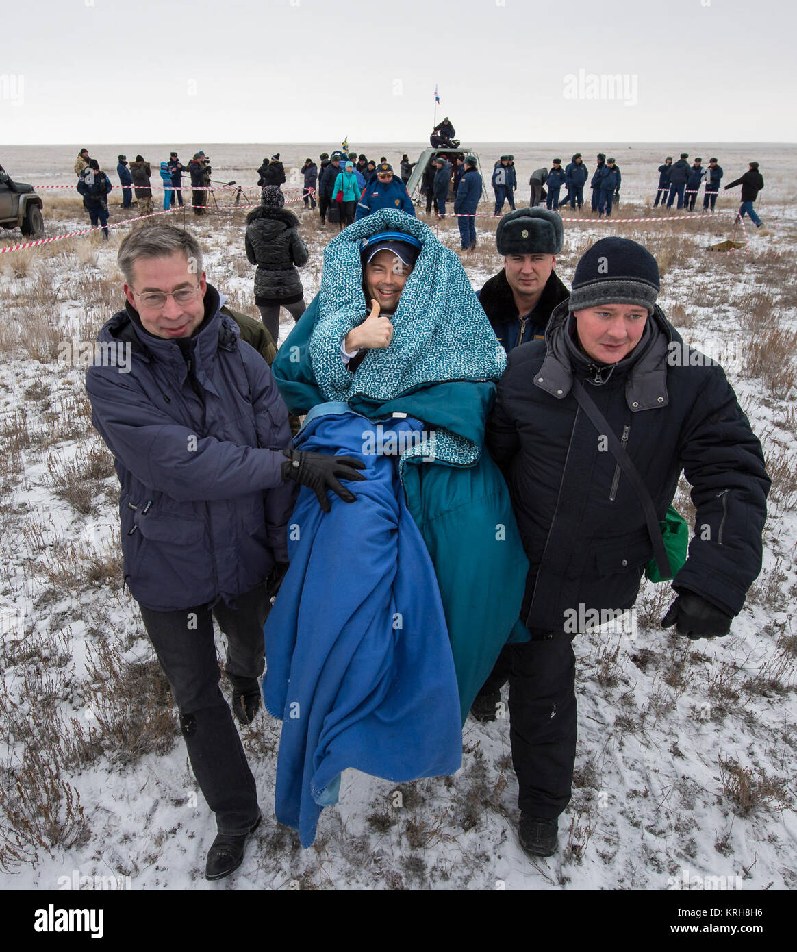 Expedition 41 Flight Engineer Reid Wiseman of NASA is carried in a chair to a medical tent after he and Expedition 41 Commander Max Suraev of the Russian Federal Space Agency (Roscosmos) and Flight Engineer Alexander Gerst of the European Space Agency (ESA) landed in their Soyuz TMA-13M capsule in a remote area near the town of Arkalyk, Kazakhstan on Monday, Nov. 10, 2014. Suraev, Wiseman and Gerst returned to Earth after more than five months onboard the International Space Station where they served as members of the Expedition 40 and 41 crews. Photo Credit: (NASA/Bill Ingalls) Expedition 41  Stock Photo