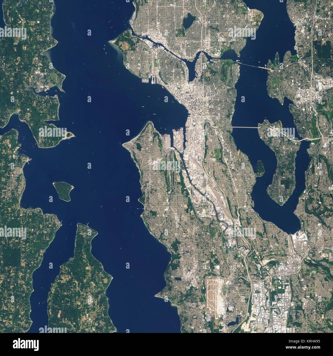 Landsat 7 image of Seattle, Washington acquired August 23, 2014.  Landsat 7 is a U.S. satellite used to acquire remotely sensed images of the Earth's land surface and surrounding coastal regions. It is maintained by the Landsat 7 Project Science Office at the NASA Goddard Space Flight Center in Greenbelt, MD.  Landsat satellites have been acquiring images of the Earth’s land surface since 1972.  Currently there are more than 2 million Landsat images in the National Satellite Land Remote Sensing Data Archive.  For more information visit: <a href='http://landsat.usgs.gov/' rel='nofollow'>landsat Stock Photo