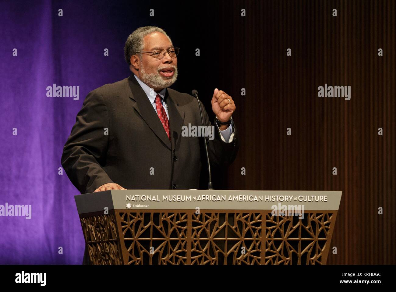 Smithsonian National Museum of African American History and Culture Founding Director Lonnie G. Bunch III speaks before a screening of the film Hidden Figures at the Smithsonian National Museum of African American History and Culture December 14, 2016 in Washington, DC. The film is based on the lives of three African-American mathematicians who worked for NASA during the John Glenn Friendship 7 mission in 1962. Stock Photo