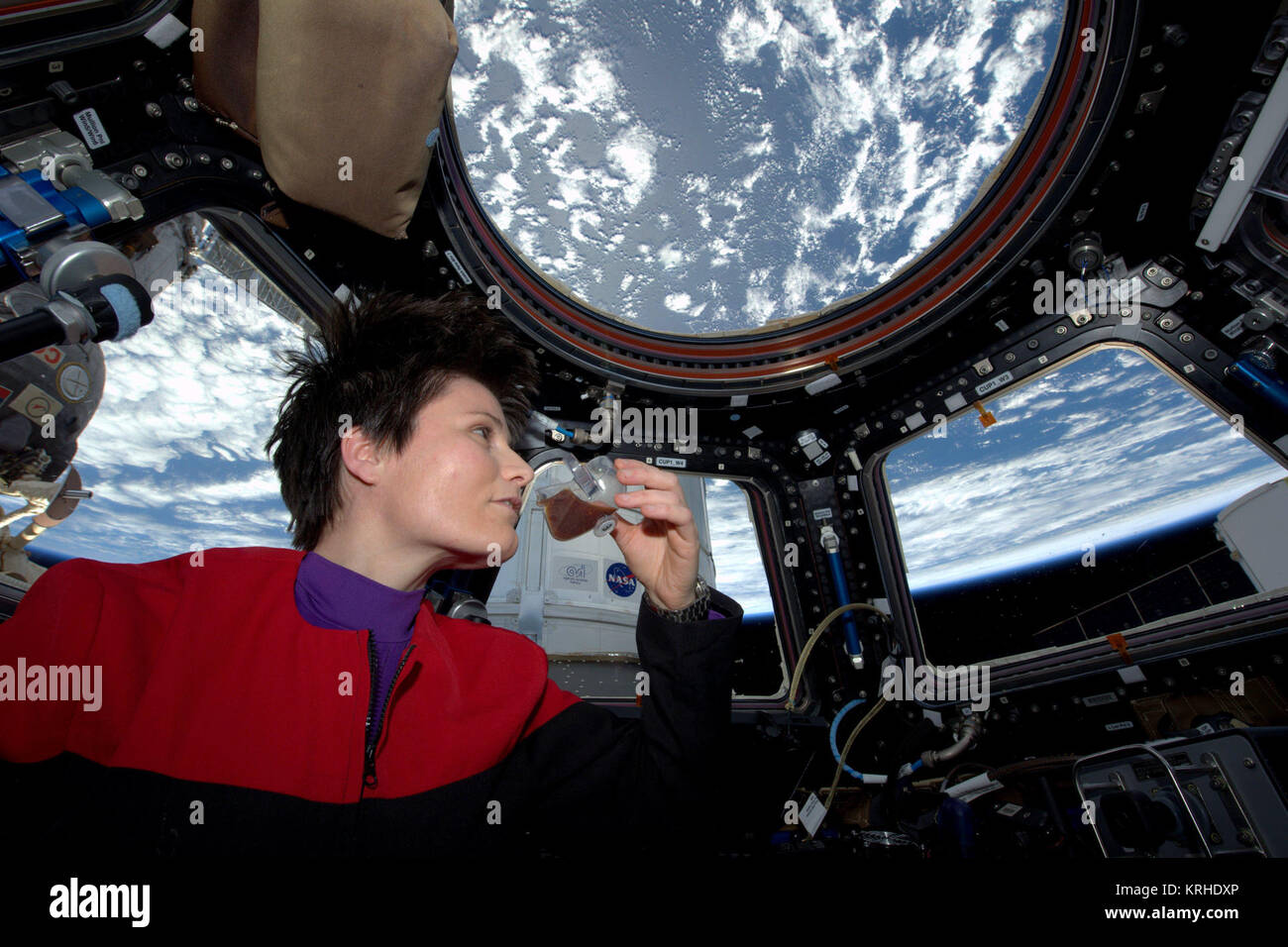 ISS-43 Samantha Cristoforetti drinks coffee in the Cupola Stock Photo