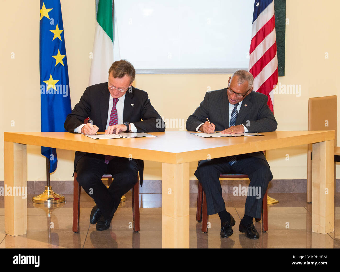 NASA Administrator Charles Bolden, right, signs a Letter of Agreement with President of the Italian Space Agency (ASI), Professor Roberto Battiston, to cooperate on Earth observation research, including environmental monitoring and disaster management, on Wednesday, September 9, 2015 at the Italian Embassy in Washington, DC. Photo Credit: (NASA/Aubrey Gemignani). NASA Bilateral Agreement with Italian Space Agency (NHQ201509090002) Stock Photo