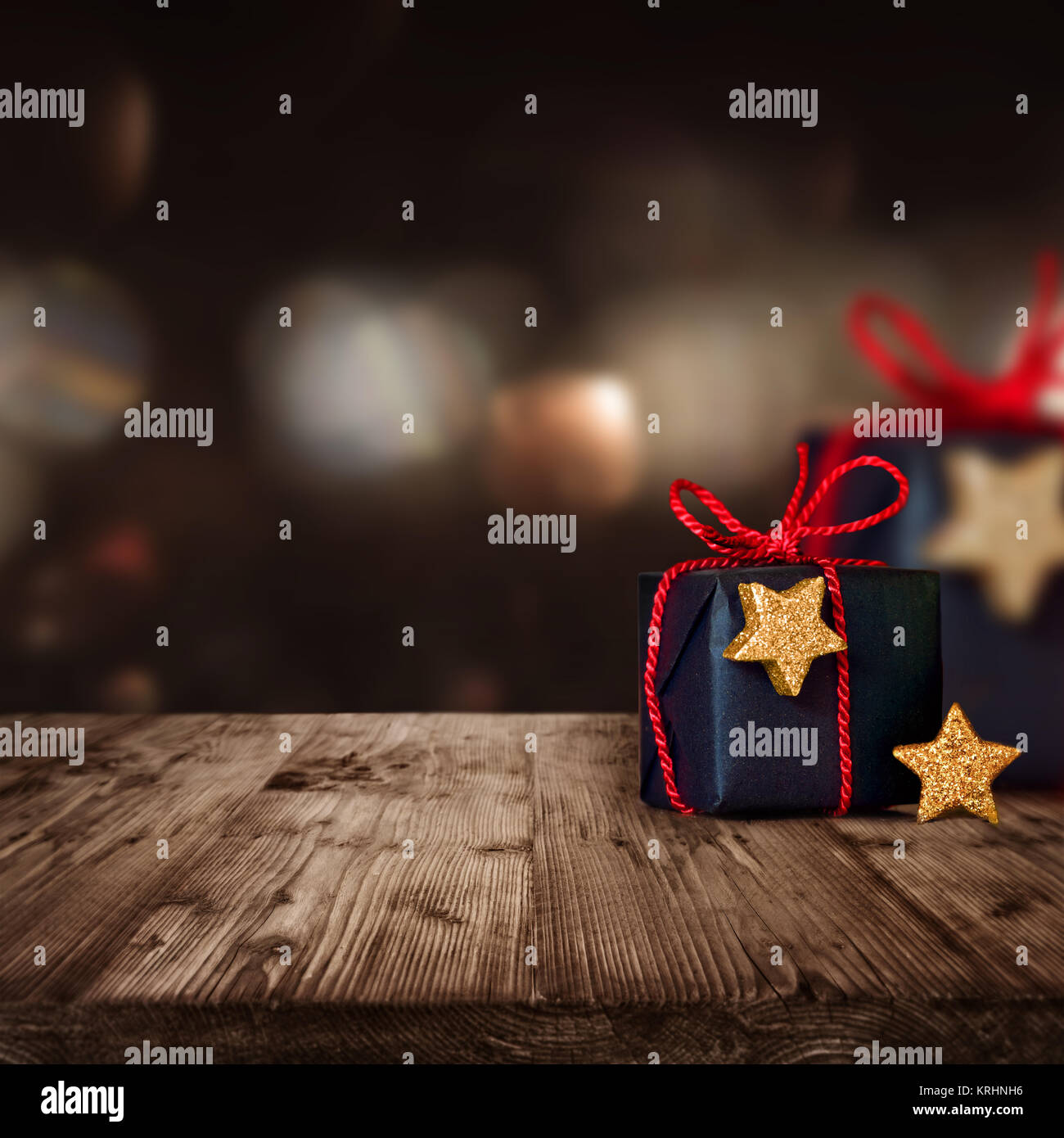 christmas parcels on a wooden table Stock Photo