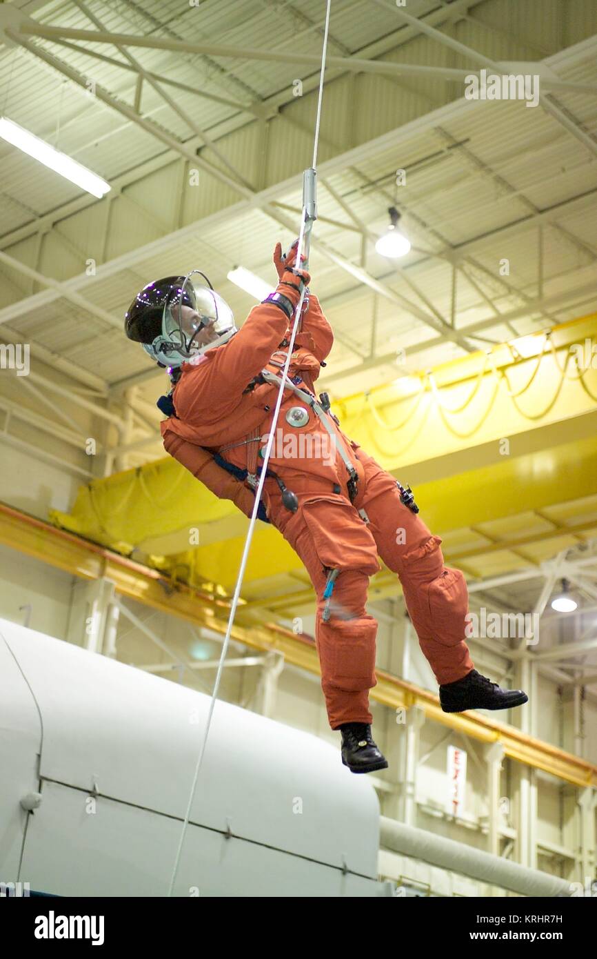 NASA International Space Station Space Shuttle Discovery STS-121 prime crew member American astronaut Michael Fossum undergoes emergency egress training at the Johnson Space Center Space Vehicle Mockup Facility August 18, 2004 in Houston, Texas. Stock Photo