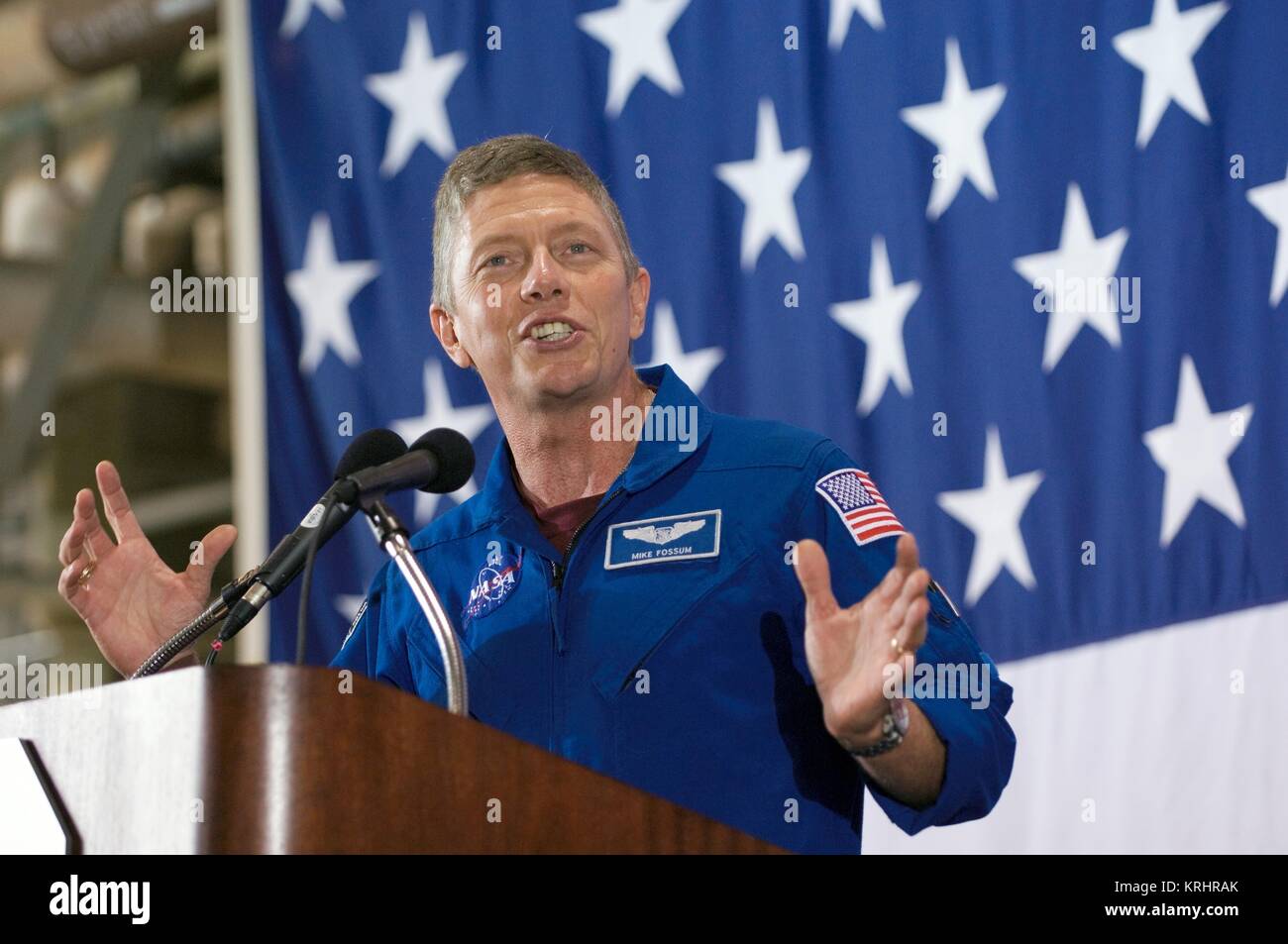NASA International Space Station Space Shuttle Discovery STS-121 mission prime crew member American astronaut Michael Fossum speaks during the crew return ceremony at the Johnson Space Center Ellington Field Hangar 276 June 18, 2006 in Houston, Texas. Stock Photo