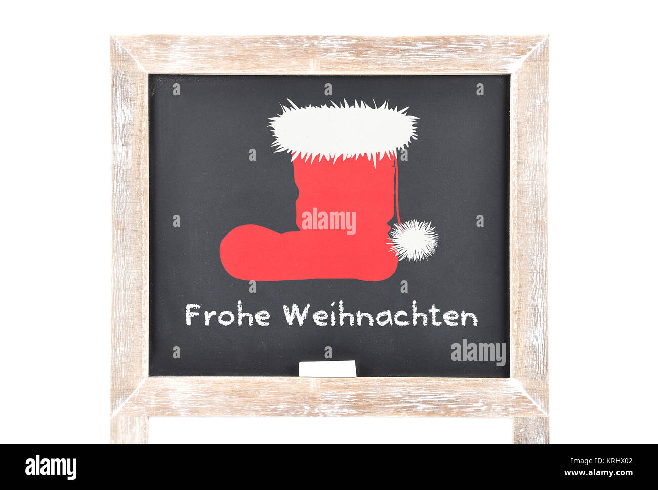 christmas greetings with santa hat on school board Stock Image
