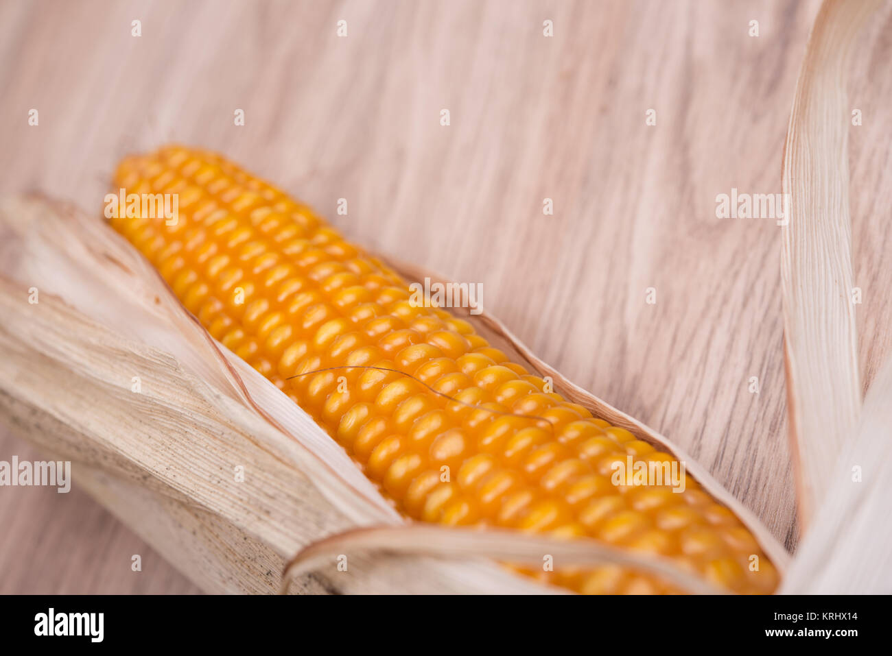 corncob on wooden ground Stock Photo