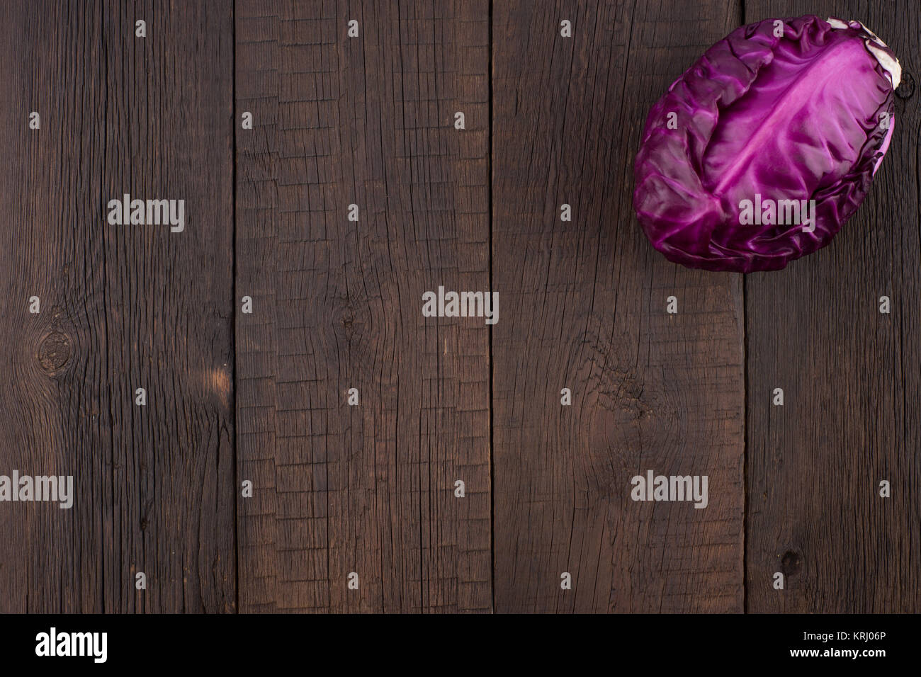 red cabbage on the old wooden table. Stock Photo