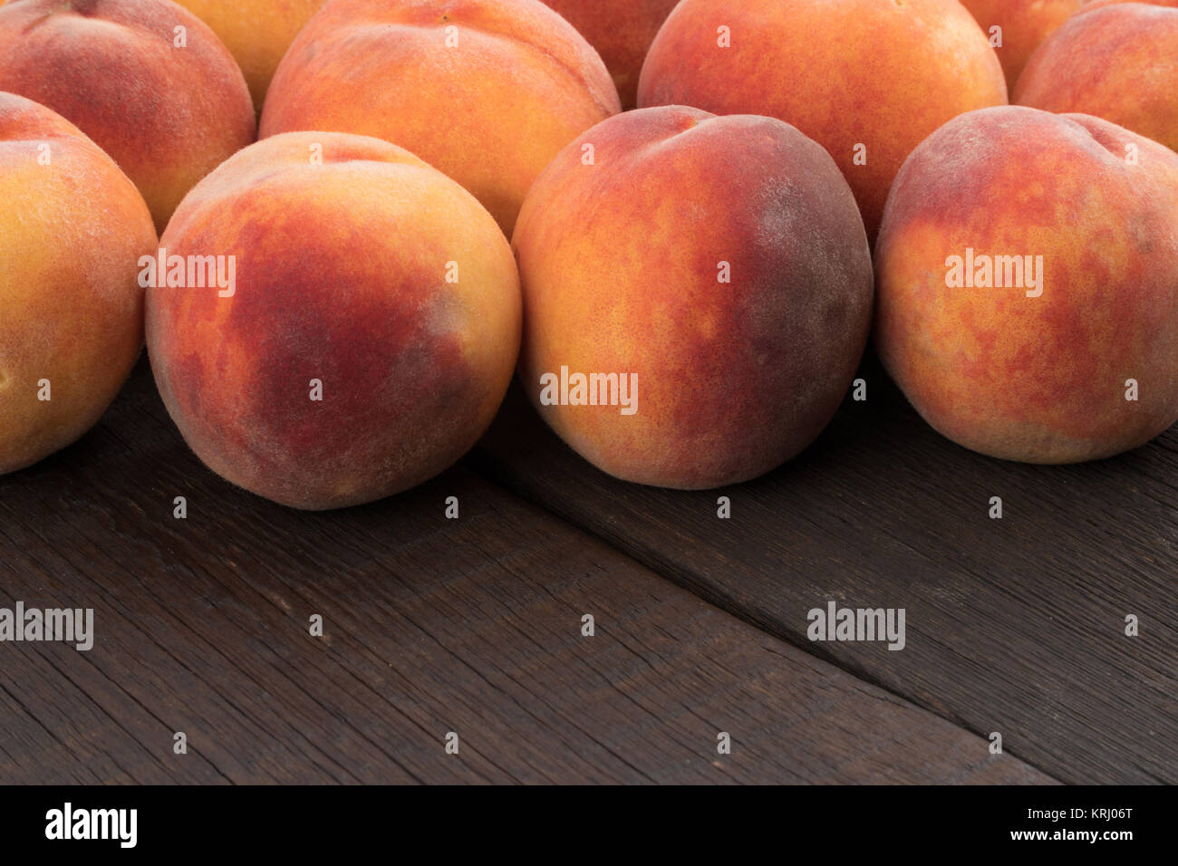 Ripe peaches on old rustic table Stock Photo - Alamy