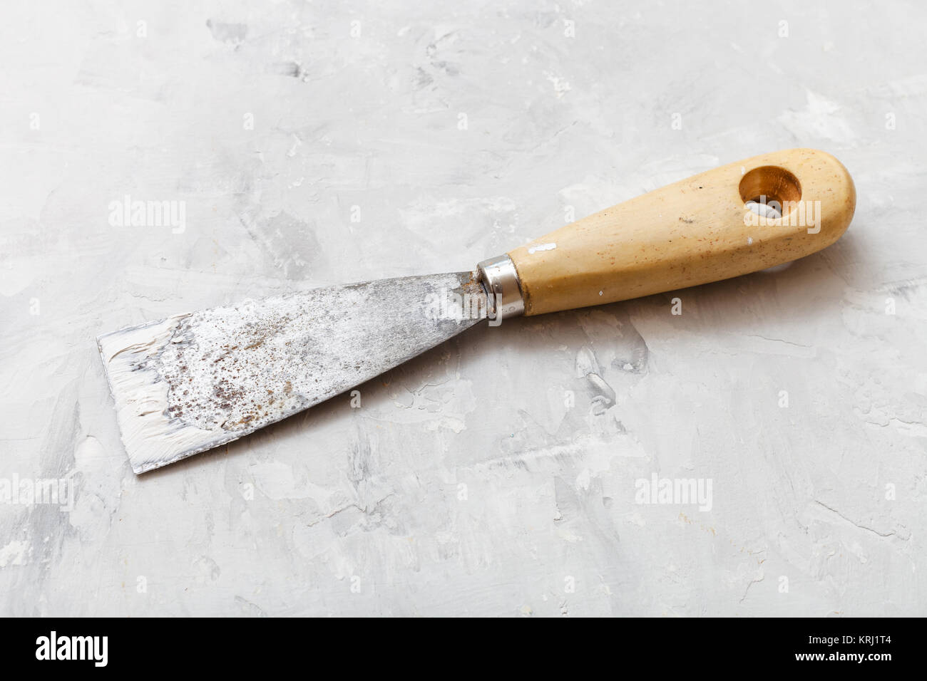 metal spatula with wooden handle on floor Stock Photo Alamy