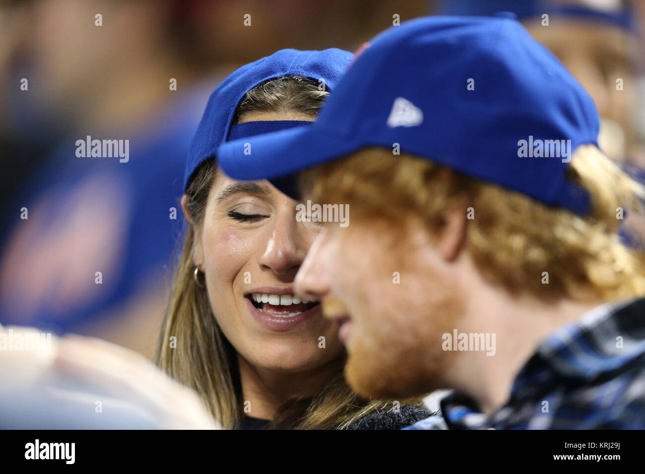 NEW YORK, NY - SEPTEMBER 02: Singer Ed Sheeran again out with his mystery lady this time at the Philadelphia Phillies Vs New York Mets at Citi Field on September 2, 2015 in the Flushing neighborhood of the Queens borough of New York City.  People:  Ed Sheeran Stock Photo