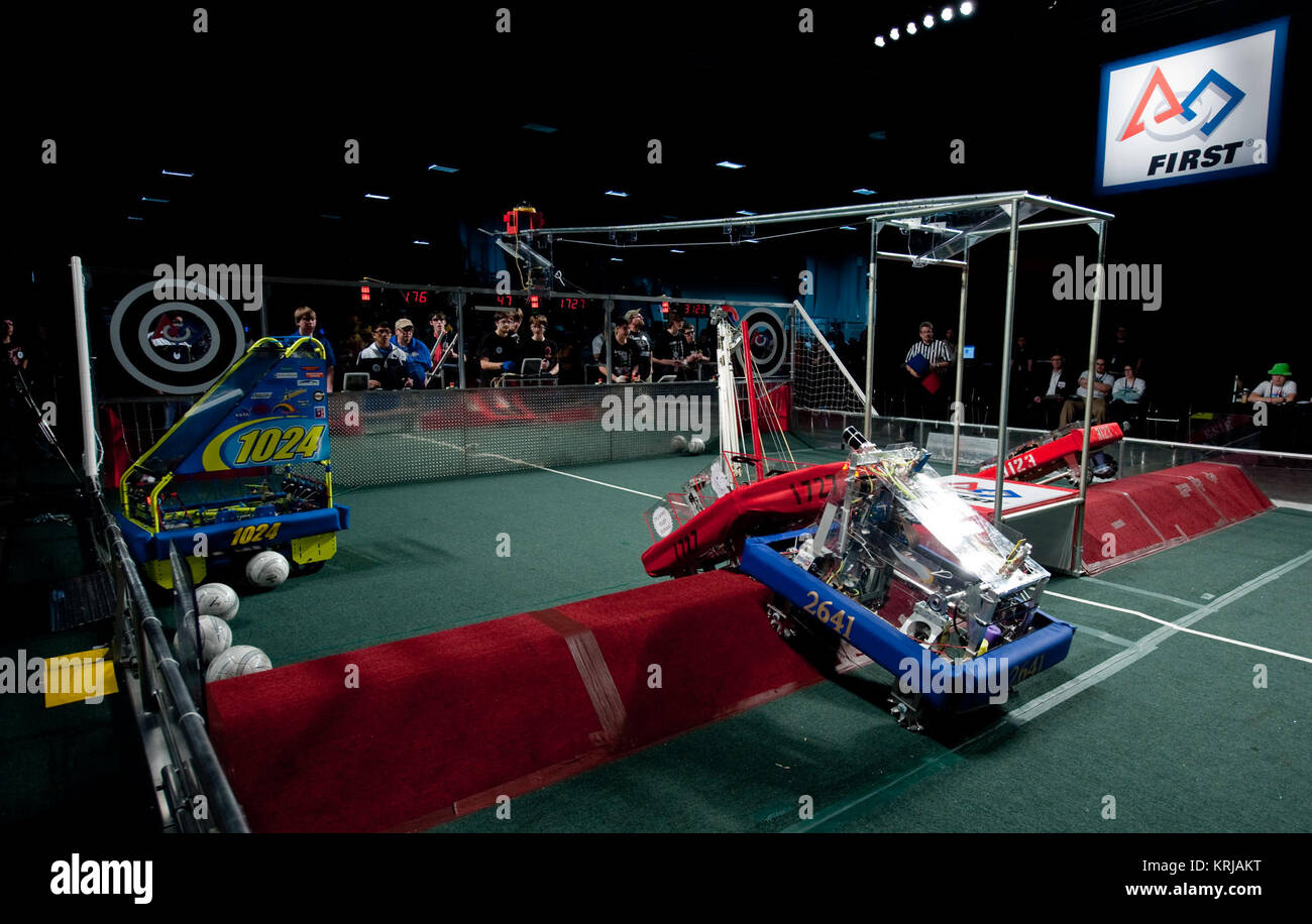 Robots vie for position during the second day of the First Robotics Competition, Saturday, March 6, 2010, in Washington. The student competition is called 'For Inspiration and Recognition of Science and Technology', or FIRST. The program was founded in 1989 by Dean Kamen to inspire an appreciation of science and technology in young people, their schools and communities. Photo Credit: (NASA/Paul E. Alers) First Robotics Competition (830928) Stock Photo