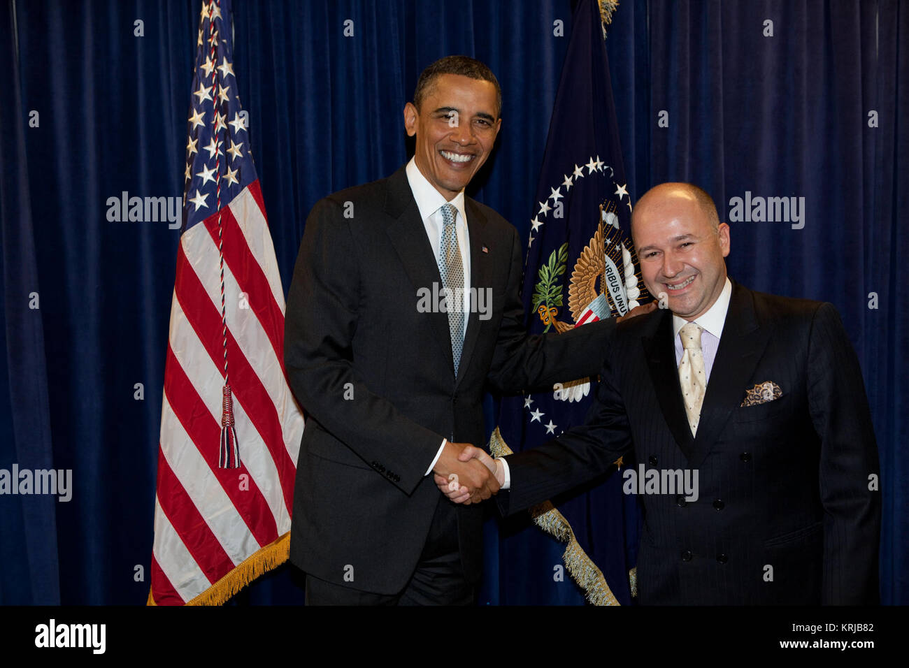 President Obama greets Baybar Altuntas of Turkey at the Presidential Summit on Entrepreneurship.  President Obama announced in his speech that Prime Minister Erdogan and Turkey will host the next Entrepreneurship Summit in 2011. (Official White House Photo by Pete Souza) With President Obama Stock Photo