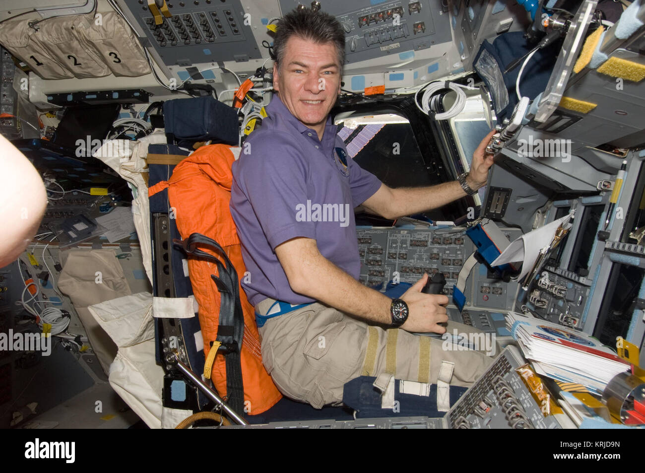 STS-133 ISS-26 Paolo Nespoli on the flight deck of Discovery Stock Photo
