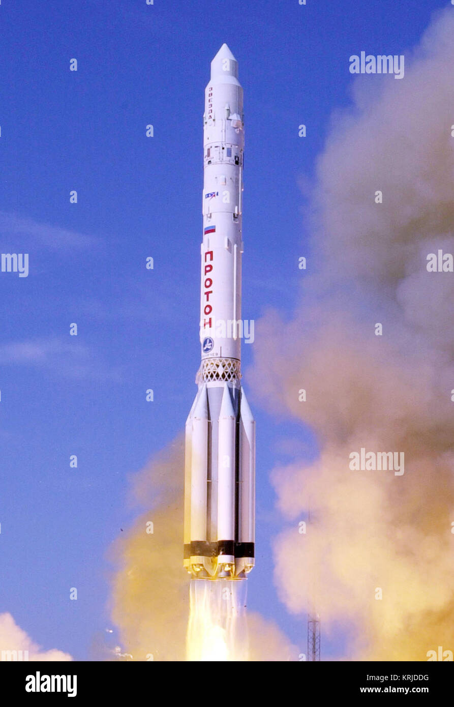 Photo credit; Scott Andrews/NASA   Caption; A proton  booster lifts off from the Bykanor Cosmodrome carrying the Zvesda, the third element of the International Space Staion   Date; 12 July, 2000 Proton Zvezda crop Stock Photo