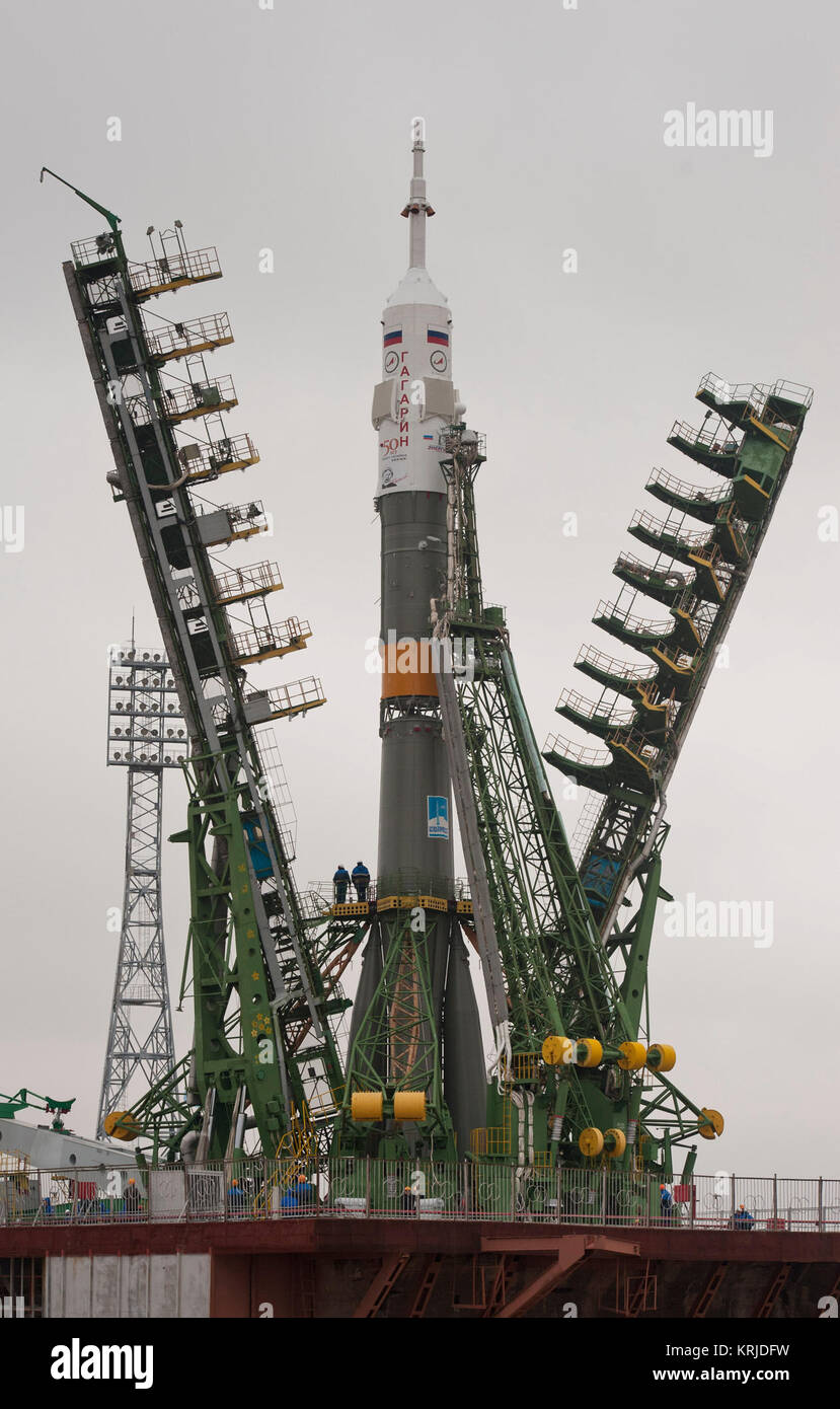The Soyuz TMA-21 spacecraft is lifted into position on the launch pad at the Baikonur Cosmodrome in Kazakhstan, Saturday, April 2, 2011. The Soyuz, which has been dubbed “Gagarin”, is launching one week shy of the 50th anniversary of the launch of Yuri Gagarin from the same launch pad in Baikonur on April 12, 1961 to become the first human to fly in space. The first stage of the Soyuz booster is emblazoned with the name “Gagarin” and the likeness of the first person to fly in space.  Photo Credit (NASA/Carla Cioffi) Soyuz TMA-21 spacecraft is lifted into position on the launch pad Stock Photo