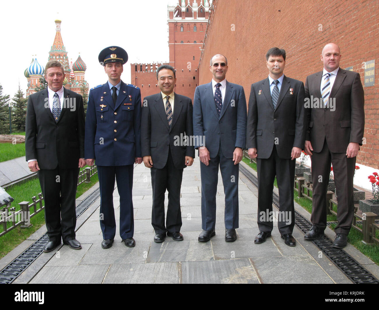 The prime and backup crewmembers for Expedition 28 to the International Space Station pose for pictures at the Kremlin Wall in Red Square May 16, 2011 after conducting traditional activities for the launch of the prime crew June 8 on the Soyuz TMA-02M spacecraft from the Baikonur Cosmodrome in Kazakhstan to the complex. From left to right are prime Flight Engineer Mike Fossum of NASA, prime Soyuz Commander Sergei Volkov, prime Flight Engineer Satoshi Furukawa of the Japan Aerospace Exploration Agency, NASA backup Flight Engineer Don Pettit, backup Soyuz Commander Oleg Kononenko and backup Flig Stock Photo