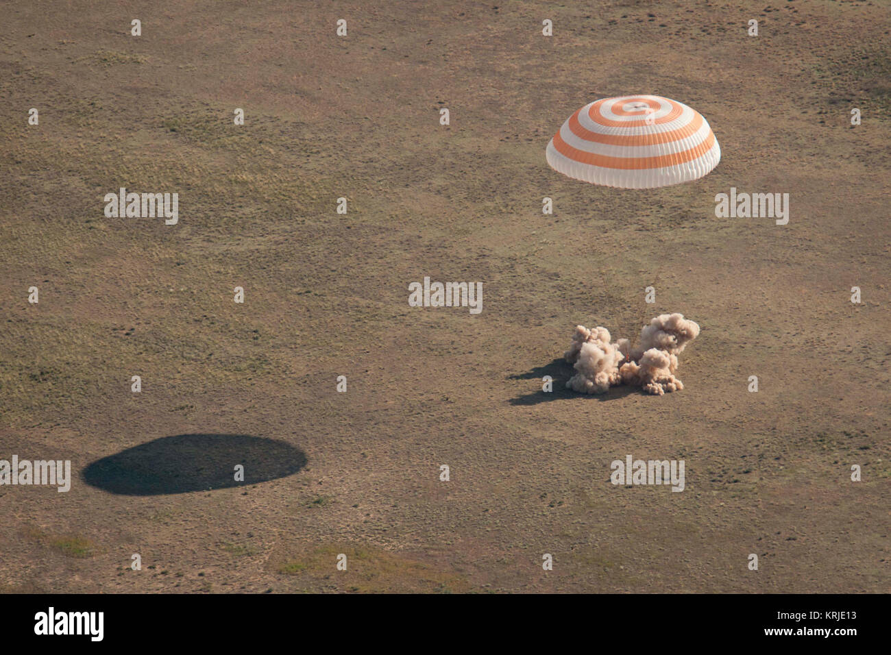 The Soyuz TMA-20 spacecraft is seen as it lands with Expedition 27 Commander Dmitry Kondratyev and Flight Engineers Paolo Nespoli and Cady Coleman in a remote area southeast of the town of Zhezkazgan, Kazakhstan, on Tuesday, May 24, 2011.   NASA Astronaut Coleman, Russian Cosmonaut Kondratyev and Italian Astronaut Nespoli are returning from more than five months onboard the International Space Station where they served as members of the Expedition 26 and 27 crews. Photo Credit: (NASA/Bill Ingalls) Soyuz TMA-20 landing Stock Photo