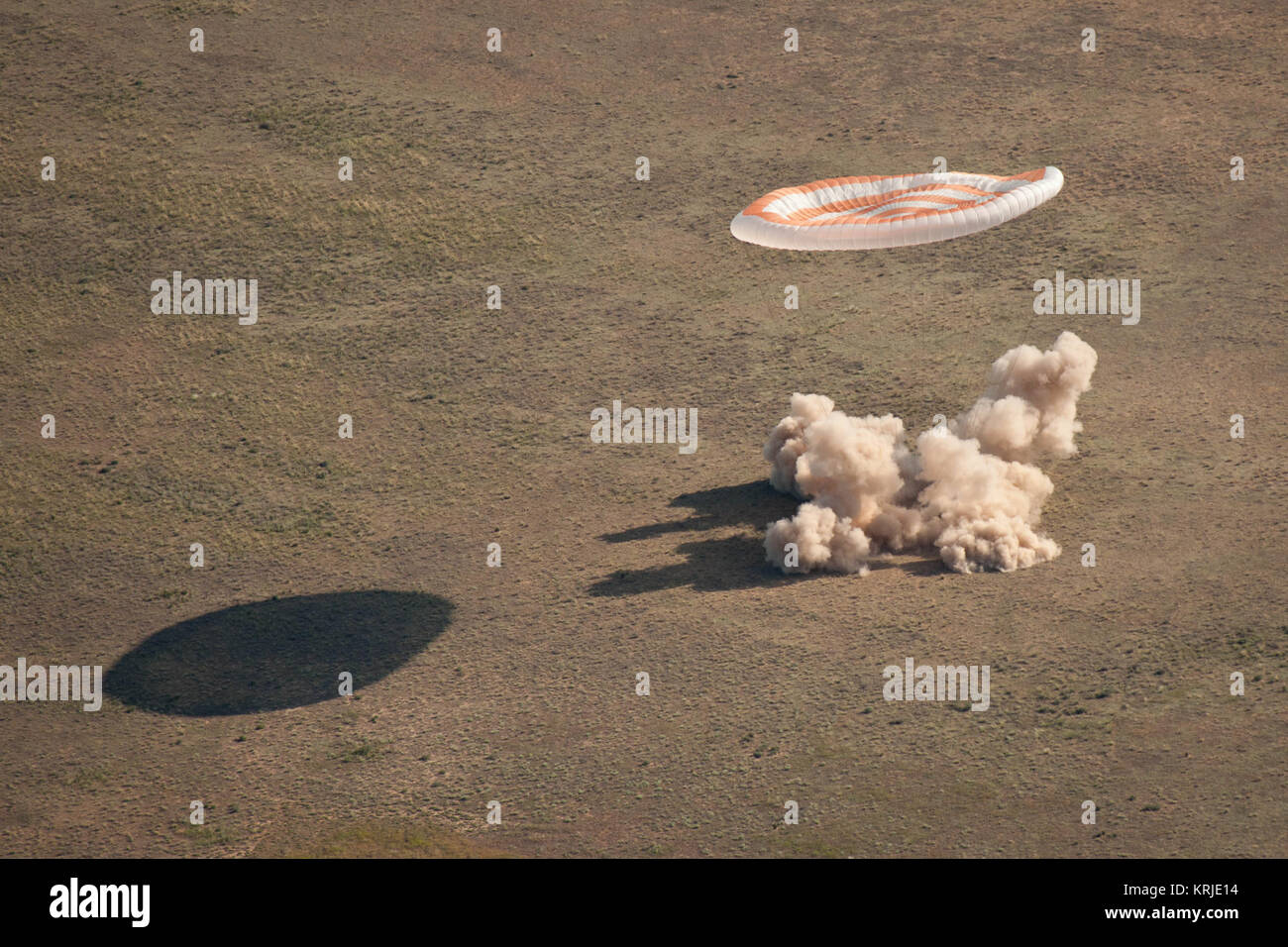 The Soyuz TMA-20 spacecraft is seen as it lands with Expedition 27 Commander Dmitry Kondratyev and Flight Engineers Paolo Nespoli and Cady Coleman in a remote area southeast of the town of Zhezkazgan, Kazakhstan, on Tuesday, May 24, 2011.   NASA Astronaut Coleman, Russian Cosmonaut Kondratyev and Italian Astronaut Nespoli are returning from more than five months onboard the International Space Station where they served as members of the Expedition 26 and 27 crews. Photo Credit: (NASA/Bill Ingalls) Soyuz TMA-20 capsule touches down Stock Photo