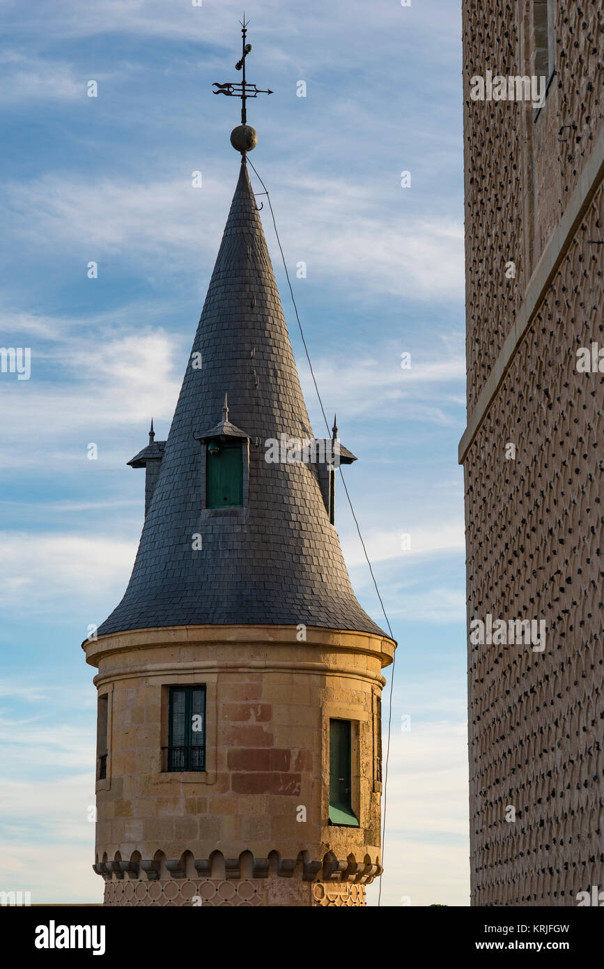 Closeup view of a minaret tower with windows rooms and weather vane, Alcazar, Segovia, Spain Stock Photo
